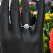 Cosmic Beauty: Round Opal Halo Ring in Silver Setting
